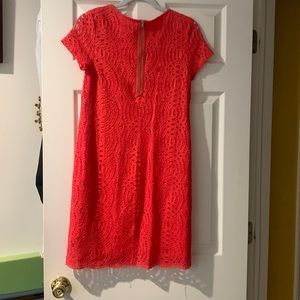 Dress. Crochet. Nylon cotton blend. Polyester lining. Just above knee length